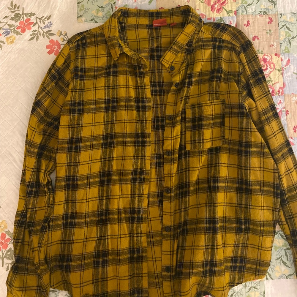 A yellow Charlie Brown button up,fresh from the washer and dryer